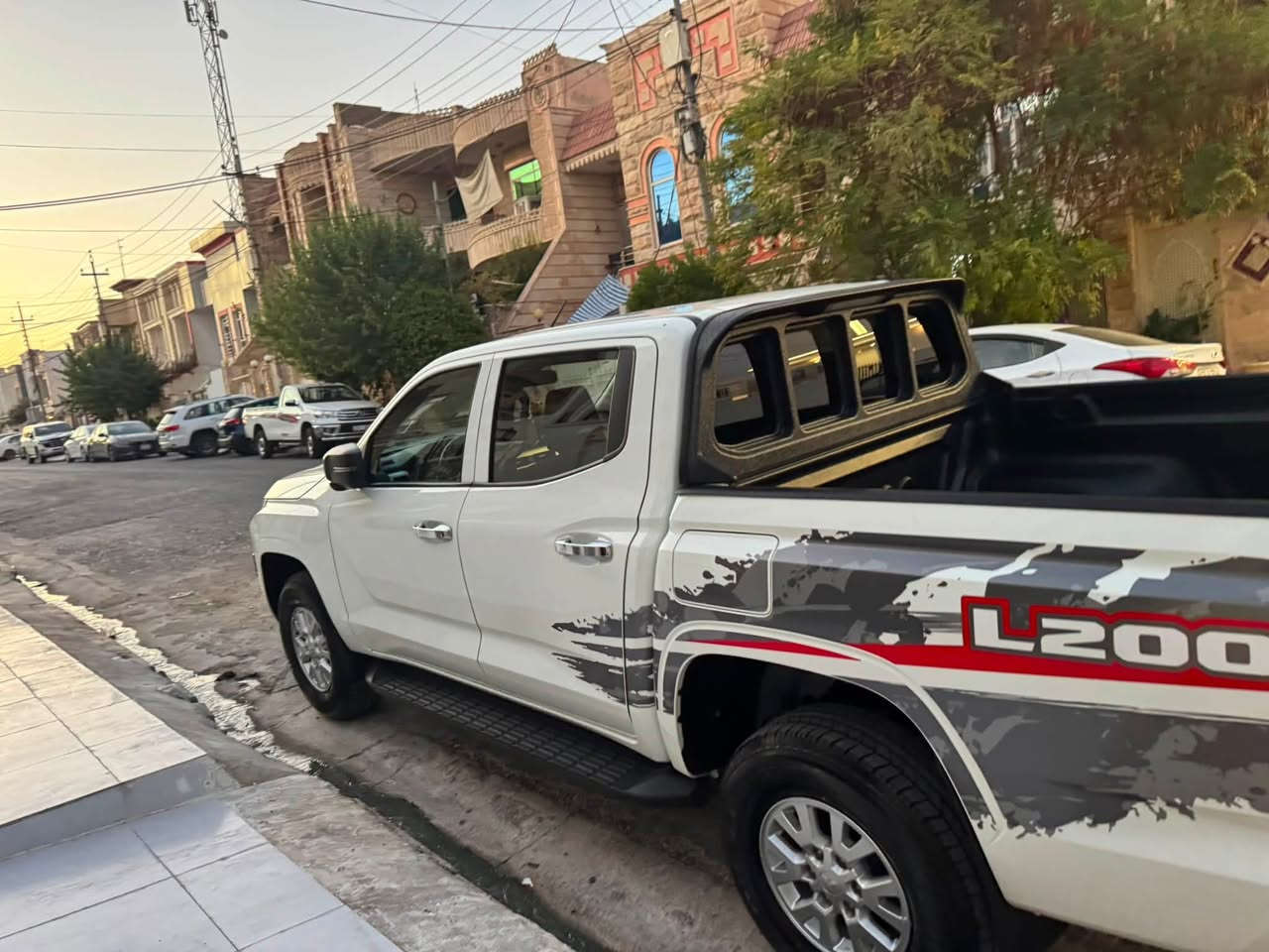 ميتسوبوشي L200 موديل ٢٠٢٥ ماشي ٢٩٠٠٠ دبل اكسل تحكم سترين شاشه كاميره ببلاد تبريد مركزي رقم أربيل سعر ٢٤٥ ورقه 
رقم موبايل ***********

