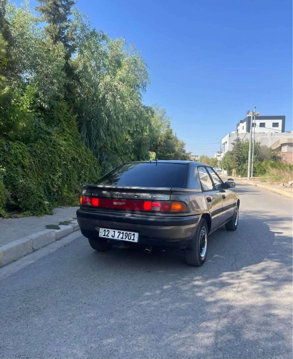 مازدا 323 موديل 1991 رقم نينوى الجديد كير توماتيك
كير محرك شرط سنوية جديدة هزه جديده سيارة بأسمي اني الشرعي شرط التحويل تبريد ثلج ❄️ تدفئة طخم تاير جديد دوشمة جديده جامات كهرب وايرمنيه كلها شرط سياره حلوه وجاهزه 
للاتصال (***********) بي واتساب شراي خابرني واني حاضر

