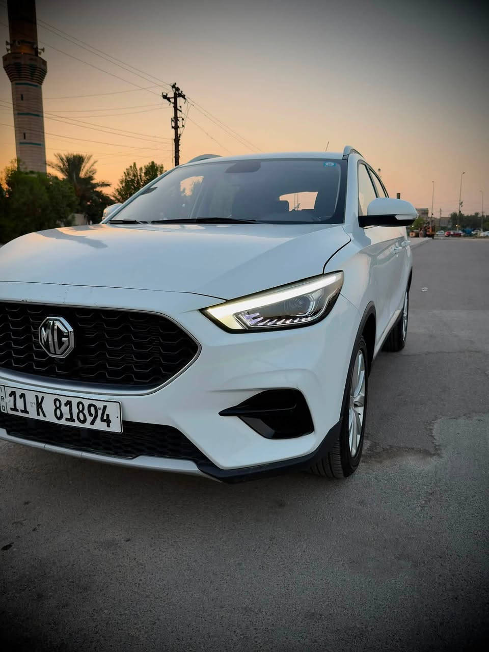 السلام عليكم ورحمة الله وبركاته
‎ MG ZS 2024 
 رقم بغداد الجديد الدولي السيارة بحالة الوكالة استلام شركة بنهاية 2025
السيارة زيرو بالضمان ماشية ( 4 الف )
بيها ملاحضات بسيطة سويتلها سونار مرفق ويا الصور
مواصفات السيارة 
* الموديل: MG ZS 2024
* محرك: 1500 اقتصادي 
* اللون: ابيض 
* ناقل حركة: أوتوماتيك
*  تشغيل بصمة + دخول ذكي
* بصمة ابواب
* ستيرن جلد ( تحكم جهتين ) 
* حاكية للإتصال والرد على المكالمات
* بلوتوث + USB
* شاشة لمس كبيرة متعددة الوسائط (اندرويد اوتو + كار بلي)
* كامرة خلفية دوارة 
* حساسات خلفية 
* هاند بريك دكمة 
* نظام اوتو هولد 
* نظام نزول منحدرات
* بصمة عدد ( 2 )
* تبريد قطعتين + تدفئة 
* لايت زنون عالي + ناصي
* لدات نهاري 
* بك لايت LED
* مرايا كهرباء + اشارات بالمري 
* كشافات هالوجين
* مثبت سرعة ESP
* مانع انزلاق المكابح APS
* حساسات نظام مراقبة ضغط الإطارات TBMS
* جنوط أصلية 
* ويل كب 
* ايرباك AIR BAG عدد ( 2 )
* حاملات اكواب عدد ( 6 )
* سبير منازل من الجنطة ولا مفتوح + المعدات كاملة الأصلية غير مفتوحة

السعر 112 و بيها مجال بسيط وماكو بهيج سعر زيرو 
مكان السيارة بغداد / حي الجهاد  الضباط
رقم الهاتف / *********** اتصال أو واتساب
