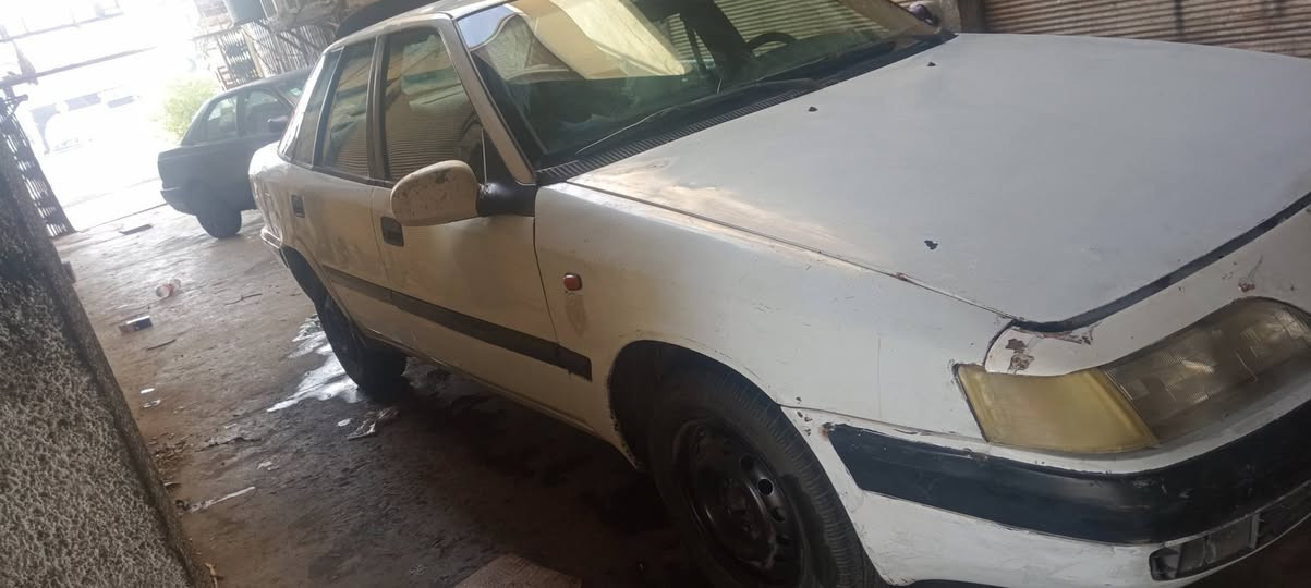 ١٩٩٥ • باسمي • كوبون بنزين