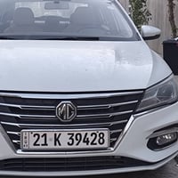 mg5   مۆدێل2023  بێ بۆیاخ مواسەفات ناوکرێمی تەعدیل سورعە ئاوێنە ئیشارە...