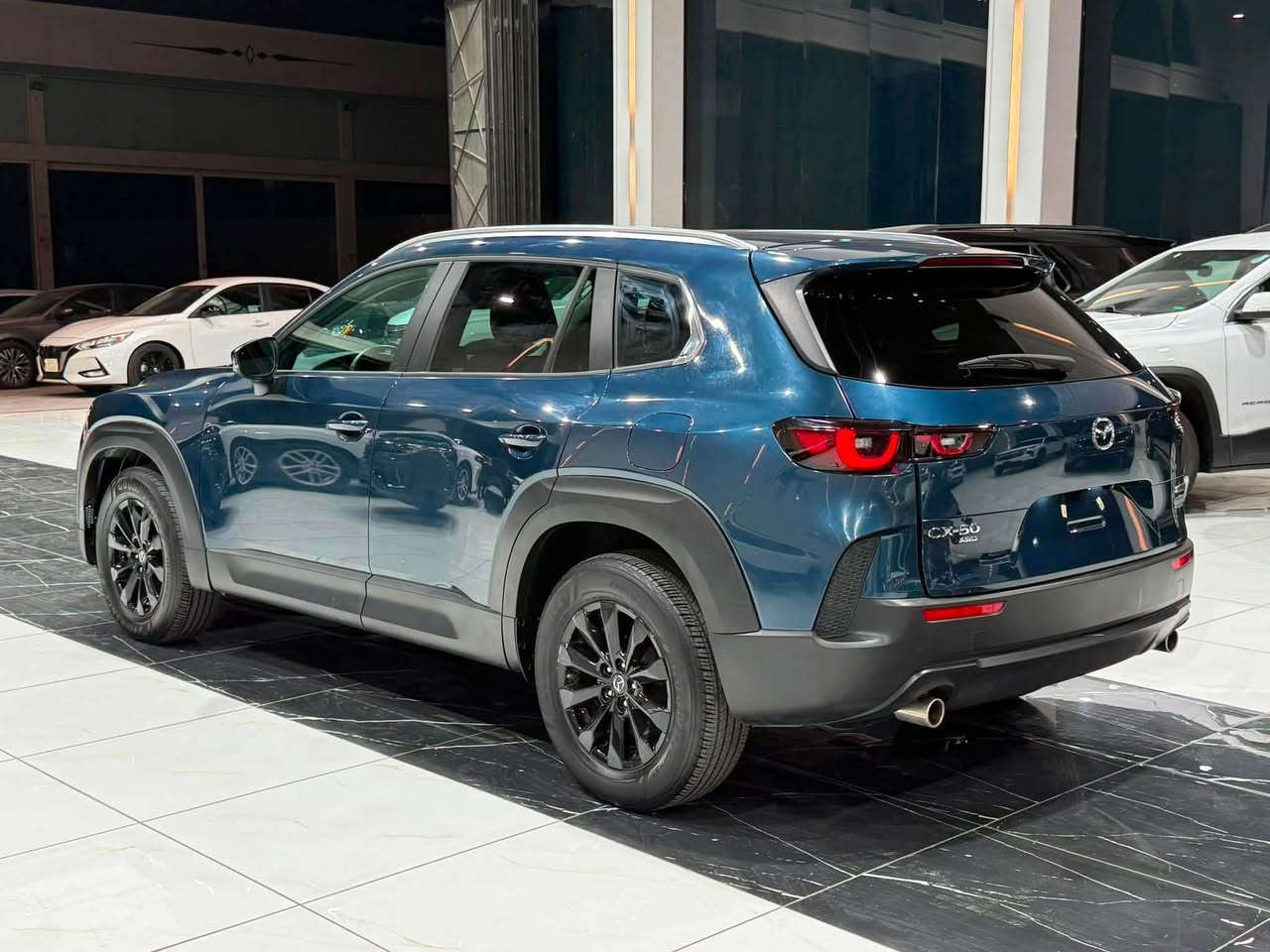 ‎مازدا Cx50 2024 فورويل AWD
‎حجم المحرك 4 سلندر 2500cc تنفس طبيعي 
‎عدد المقاعد 5 راكب
‎السیارة ماشي 8 الف
‎حادث نص جملغ الخلفي  السائق 

‎مواصفات فول
‎- بصمة
‎- دخول ذكي بدون مفتاح
‎- دبل اكسل
‎- بانوراما
‎- مود درايڤ ايكو وعادي وسبورت
‎- رادار امامي خلفي
‎- تحديد مسار
‎- نقطة عمياء
‎- كشنات جلد
‎- شاشة
‎- ⁠كاربلي CarPlay 
‎- كامرة خلفية
‎- تبريد مركزي قطعتين
‎- صندوق خلفي كهرباء
‎- سايد بريك لمس
‎- اوتو هولد
‎- لايت امامي ليد
‎- هيتر -تبريد كشنات امامية
‎- هيتر ستيرن 
‎- اشاير مري
‎- تخم تاير جديد 
‎- تخم دسكات جديد 
‎وبقية المواصفات موضحة بالصور ‎
‎مکان سیارة اربیل السیارە رقم کاتي تترقم شمالي
‎للاتصال والاستفسار
‎☎️کورك ***********
‎‏‎☎️اسیاسیل ***********
