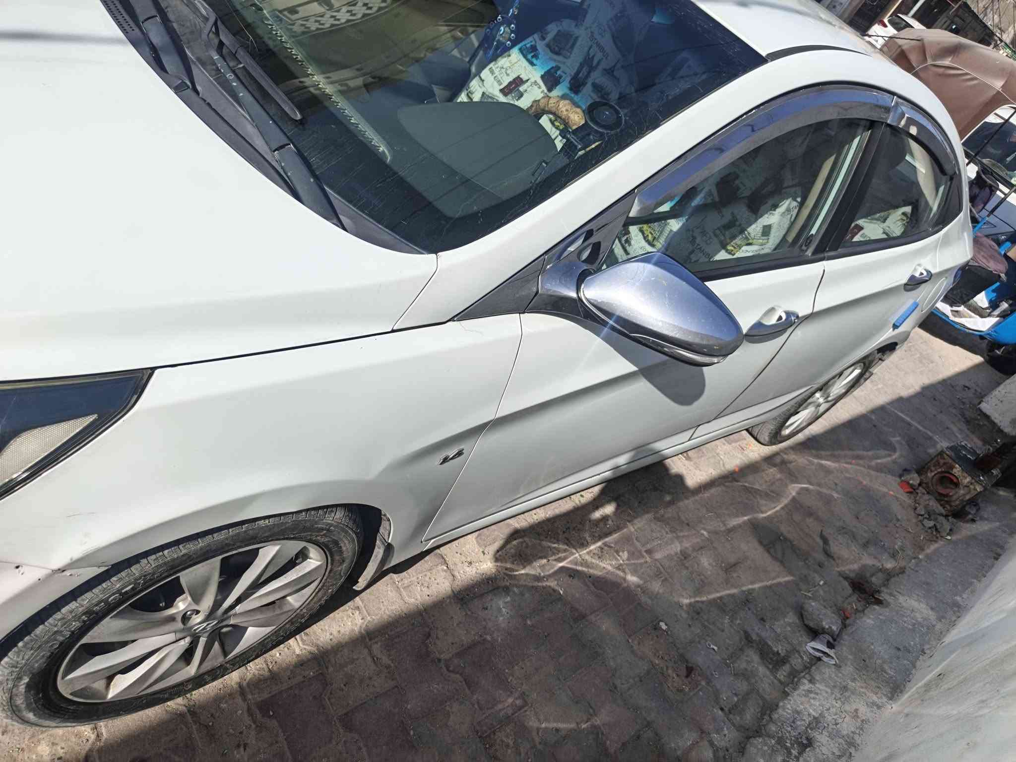 اكسنت 2013لبيع خليجي كامله من كلشي ما عدا ضربه باب خلفي موضح بصورة كير مكينه تبريد مكان بغداد *********** سعر 90
