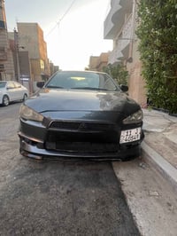 لانسر قرش 2009 مكينه 2000 مواصفات نص فول صدر امامي خلفي 70 ‎%‎ نضيف  ا...