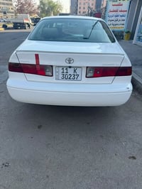 كامري 2000 للبيع عنواني شارع فلسطين بغداد سيارة جاهزه من كلشي السعر  0...