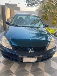 لانسر • ٢٠١٠ • محرك وكير كفالة