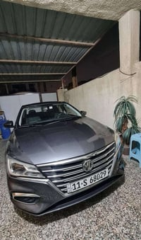 سياره MG5 موديل 2022لون رصاصي ماشيه 65000 كيلو متر قابله للزياده موجود...