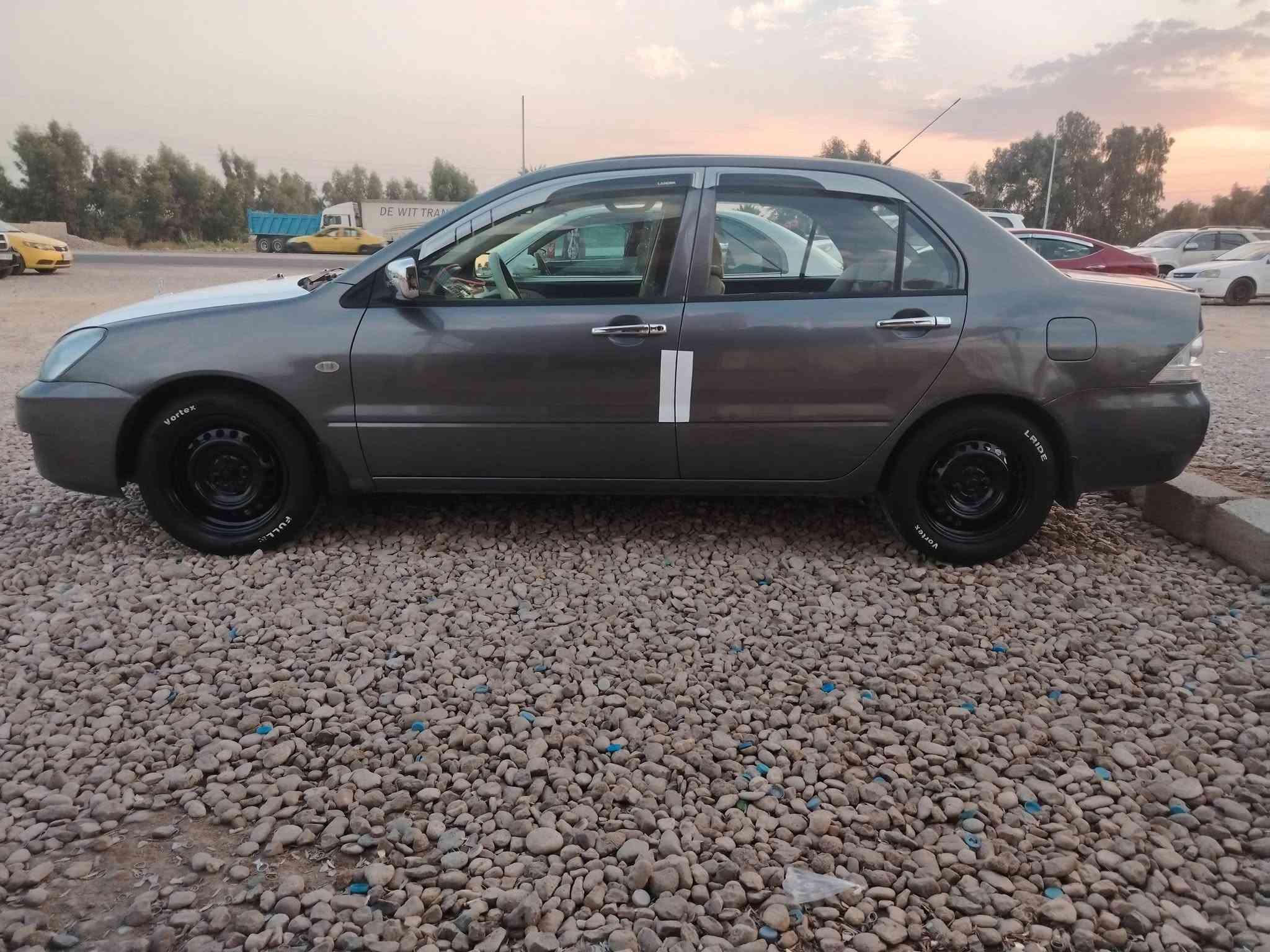 السلام عليكم لانسر موديل ٢٠١٠ رقم ديالى مشروع وطني سنويه ل٢٨ كير محرك تخم تاير صدر تبريد تدفئه كله مكفول السعر ٨٠بيه مجال بسيط العنوان ديالى كنعان  ***********
