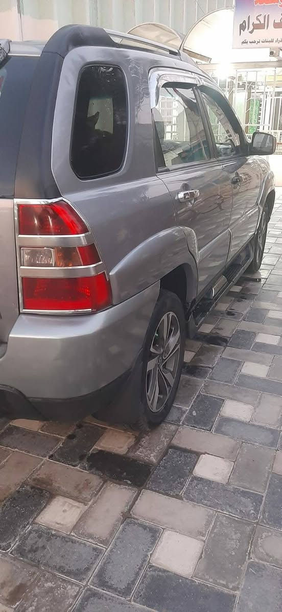 سبورتج ٢٠٠٩ رقم انكليزي بغداد باسمي سيارة جاهزة ضررها جاملغ وبنيد مصبوغ فتحة سقف تبريد شاشة حساسات خلفية كاميرة تخم تاير ويل كب حديث كشنات جلد مطعم لايت زنزن بلوجكتر زنون محرك ٢٧٠٠ ترهم مراوس انترا المقدس بغداد رقم الهاتف ***********
