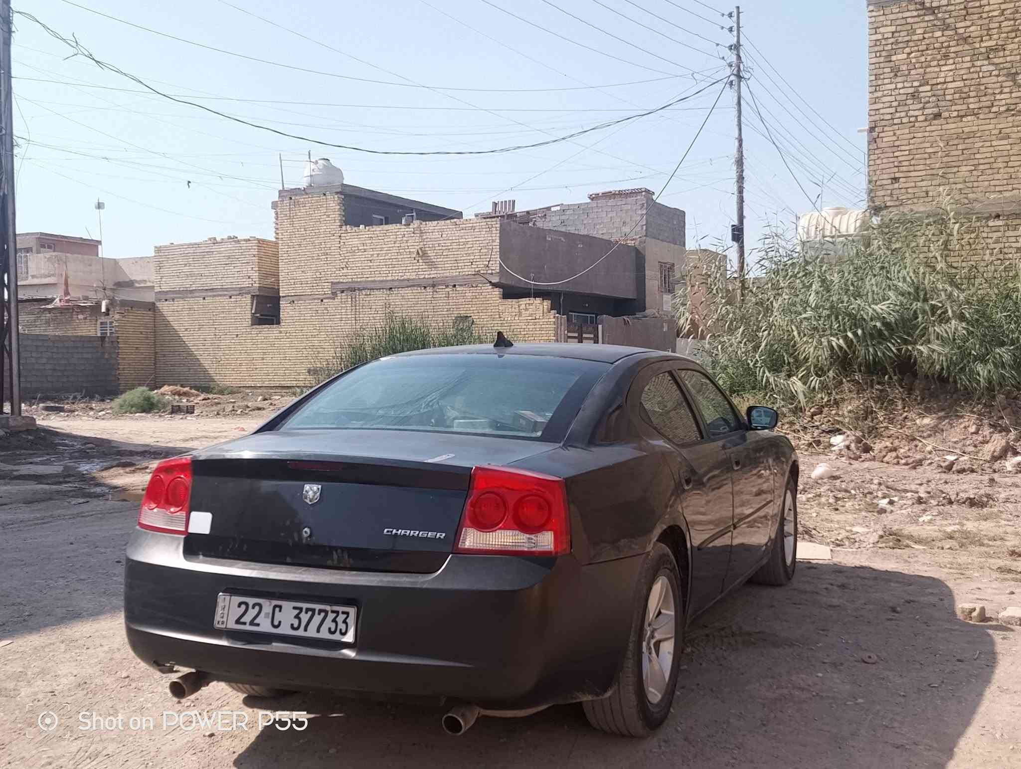 جارجر 2008 مكينه 3500 كير ومكينه خير من الله تخم تاير صدر زين تبريد شغال داخل لونين رقم اربيل  السيارة مصبوغه عام وبيها تبديل باب السائق السعر 85 وبيها مجال بسيط المكان بغداد سبع البور الرقم ***********

نص مكتوب في الصور:
- Shot on POWER P55