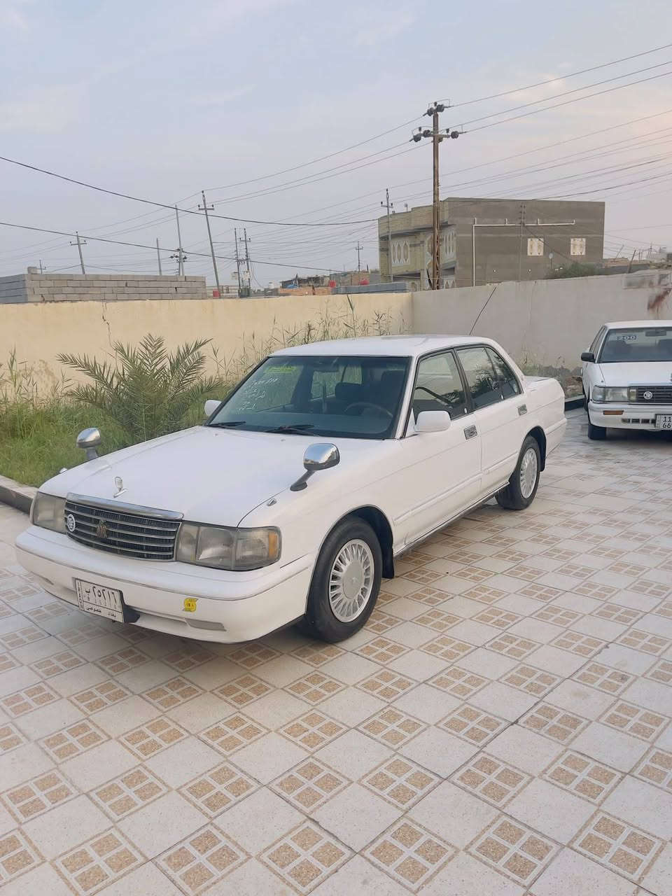 كورولا ٩٥ • ابيض • رقم بغداد