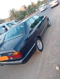 بي ام دبليو 735 • موديل ١٩٩٠ • رقم بغداد