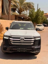 GXR ليمتد • ٢٠٢٥ • جلد احمر واسود