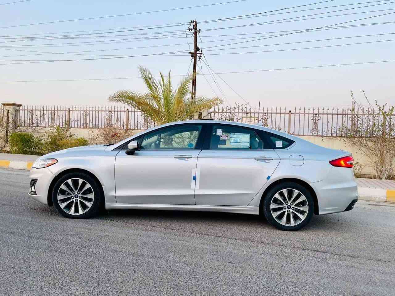 السلام عليكم…الحلال للبيع
 بسعر 109$ورقه اعتذر عن الاقساط 
فورد فيوجن 2019 SE ايكو بوست امريكي فووول 1/1
 لون رصاصي سلڤري مميز جداً  
كير اوتوماتيك  بوصله بدون عيب
محرك 2000 تنفس طبيعي 4سلندر المرغوب بدون فتح بدون عيب (يعني مو تيربو )
❇️مواصفات فوول 1/1 للاخير❇️
بصمه تشغيل وابواب وصندوق
فتحه سقف زجاج 
رادار امامي وكامره 
رادار جانبي 
نظام سبورت S 
دبل كزوز 
شفتات ستيرن كير رياضي
داخل اسود ملكي جلد
كشن السايق والراكب كهرباء 
قطعتين تبريد
شاشه كار بلي حجم كبير وكامره دواره
كروس سرعه
تحكم ستيرن 
عداد ديجتل ودبل شاشه عرض اعطال
بلوجكترات 
حساسات خلفيه
بك لايت ليد
لايت عدسه زينون بلادي 
ويل كب 18 كروم بلادي
تبريد ثلج 
وبعد بيها هوايه مواصفات …. 

🔴سياره جاهزه من كلشي تشغل وتطلع 
السياره بيها صبغ جاملغ السكن  ونص الباب ملاون كلير فقط بدون اي دواخل بدون تبديل شرط السونار

رقم 25 انكليزي الجديد / تحويل بنفس اليوم 
السعر 109$ ورقه وبيها مجال بسيط
🔺مكاني تكريت القادسيه
***********
***********
