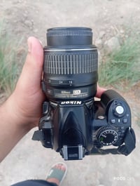 Nikon D3100 • عدسة 18-55 VR • نظيفة
