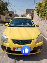 كيا ريو • ٢٠٠٦ • رقم بغداد مسطرة