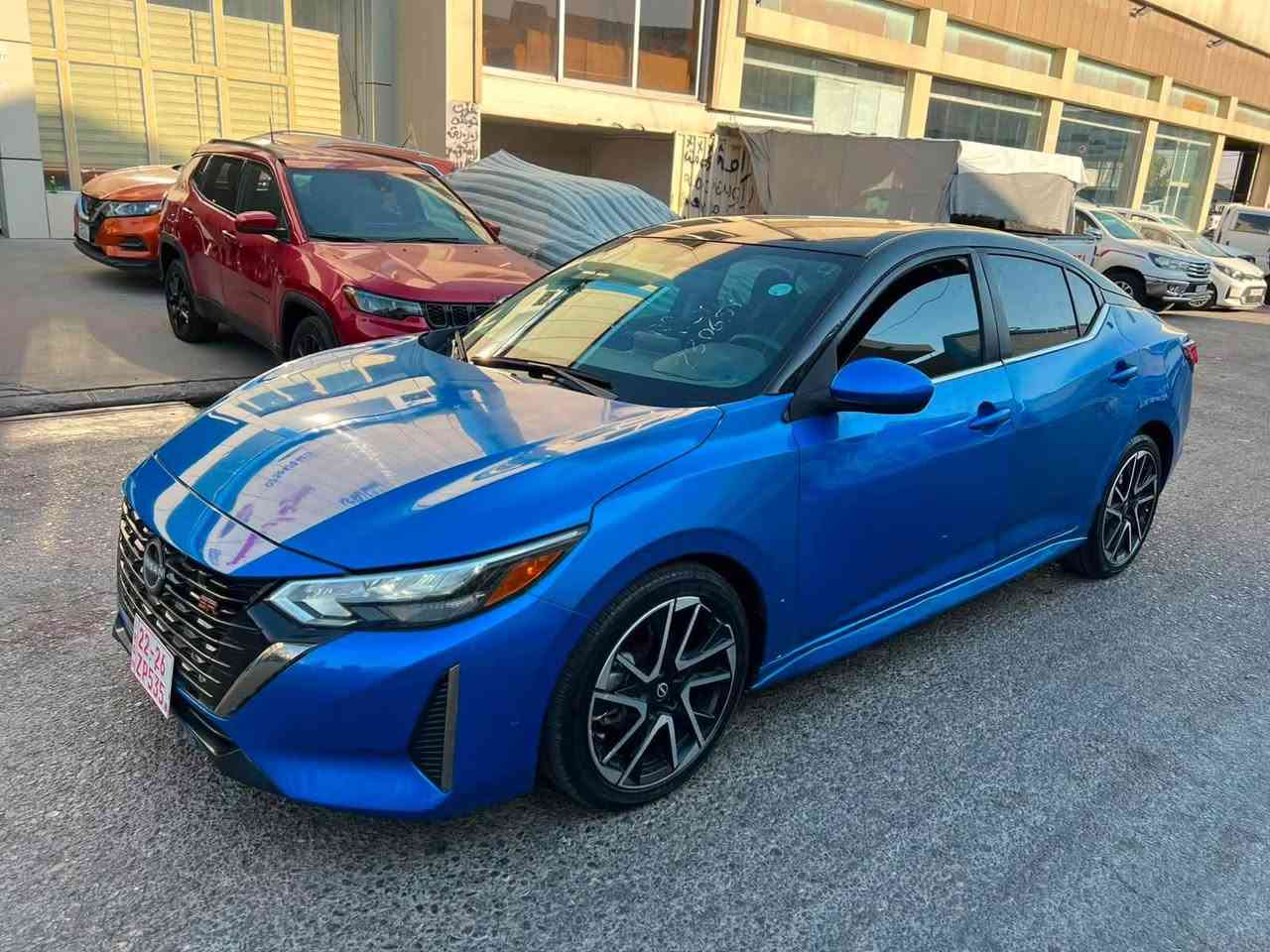 نيسان سنترا SR 2025 ماشية ١٨ 
سقف اسود بلاد فول مواصفات كشن هيتر لايت زينون سقف اسود ويل كروم ١٨ بصمة رادارت حساسات كير محرك تبريد كلها شرط كاتي تترقم اربيل سليمانية بيها تبديل باب بلاد نفس اللون وباب جملغ امامي صبغ مع حافة بونيد بجم خلفي كبس راديترات لايتات بلاد شرط الفحص مكان سيارة كركوك شراي اتصل واتس اب موجود *********** كركوك, العراق

نص مكتوب في الصور:
- ***********
- ***********