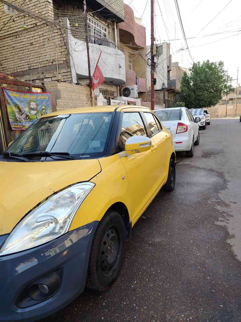 سازوكي سويفت صفره بغداد  ٢٠١٤ محرك ١٤٠٠ محرك جديد حاوية بيها ضربة بدعامية ومبدلة السعر ٦٠ رقم *********** مكاني بغداد
