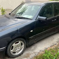 مارسيدس ام عيون E230 موديل 97 لون اسود كحلي  مكينه خراطيم كير اوتو كشن...