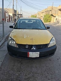 لانسر ٢٠١٠ • مكينة ٢٠٠٠ • اوتوماتيك