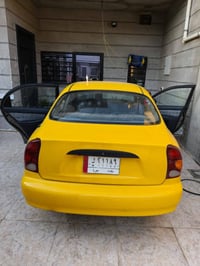 دايو لانوس موديل 2000لبيع رقم بغداد رقم موبايل 07823672304
