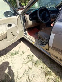 كيا سيفيا موديل 2000 السياره بلاديه ما مصبوغه رقم بغداد ب اسمي سنويه ل...
