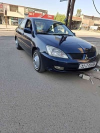 لانسر خليجي • ٢٠٠٩ • اسود