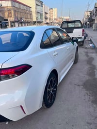 كورلا هايبرد موديل 2023 للبيع مواصفات معروفه تجميع صيني شكل الامريكي د...