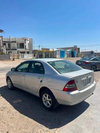كورلا • ٢٠٠٣ • كفالة عامة