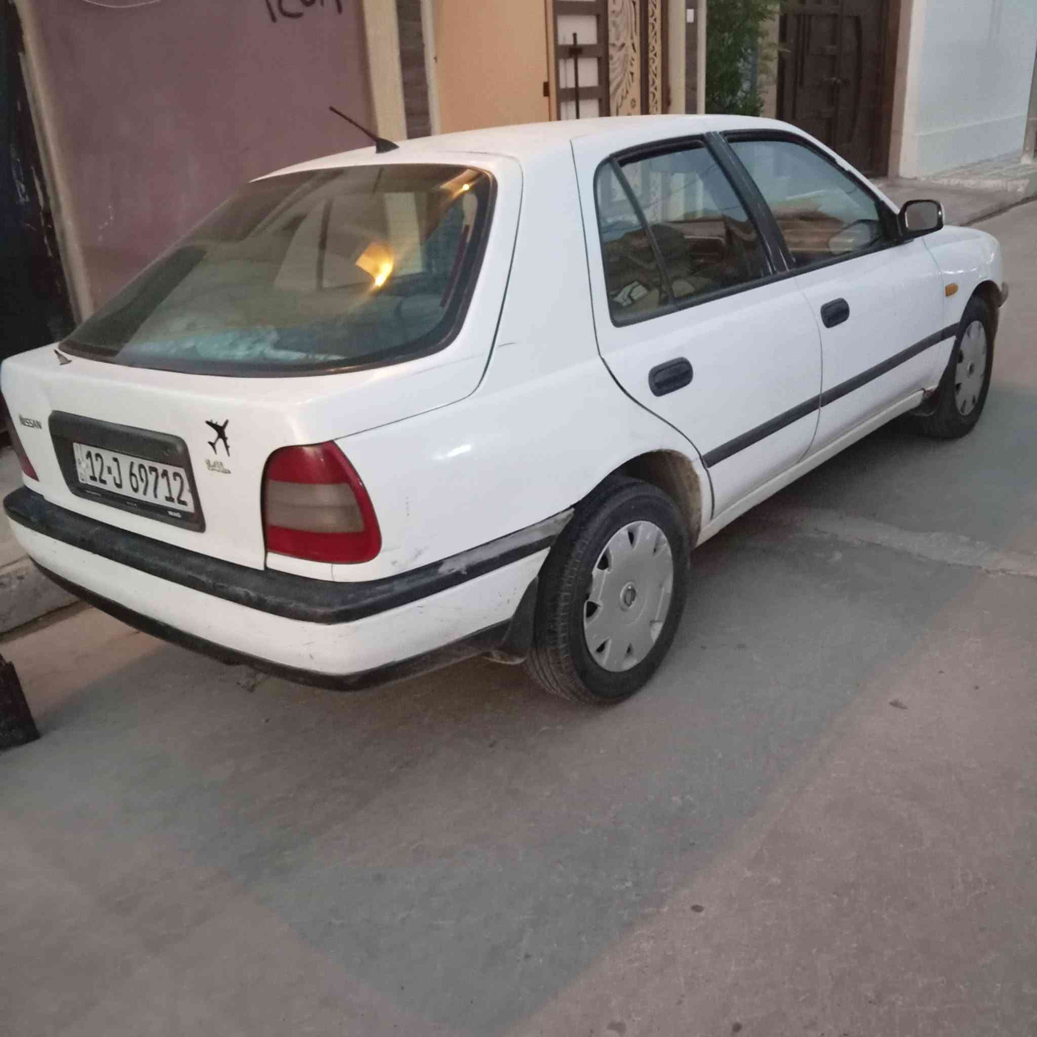 نيسان صني للبيع موديل ٩١ كير عادي شرط المحرك والكير 🕸السعر ٣٠ 
0773702754___***********
