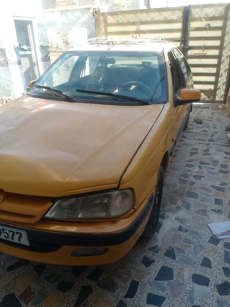 السلام عليكم بيجو بارص مديل 16 مكينه وكير خير من الله بيهه جاملغ خلفي بنيد تعبان بيهه بوربنين لمامي تعبان السعر 32بيهه مجال ***********
