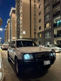 للبيع لاندكروز 2002 رقم بغداد بأسمي كير عادي اصل قطري مكينه 6 سلندر سب...