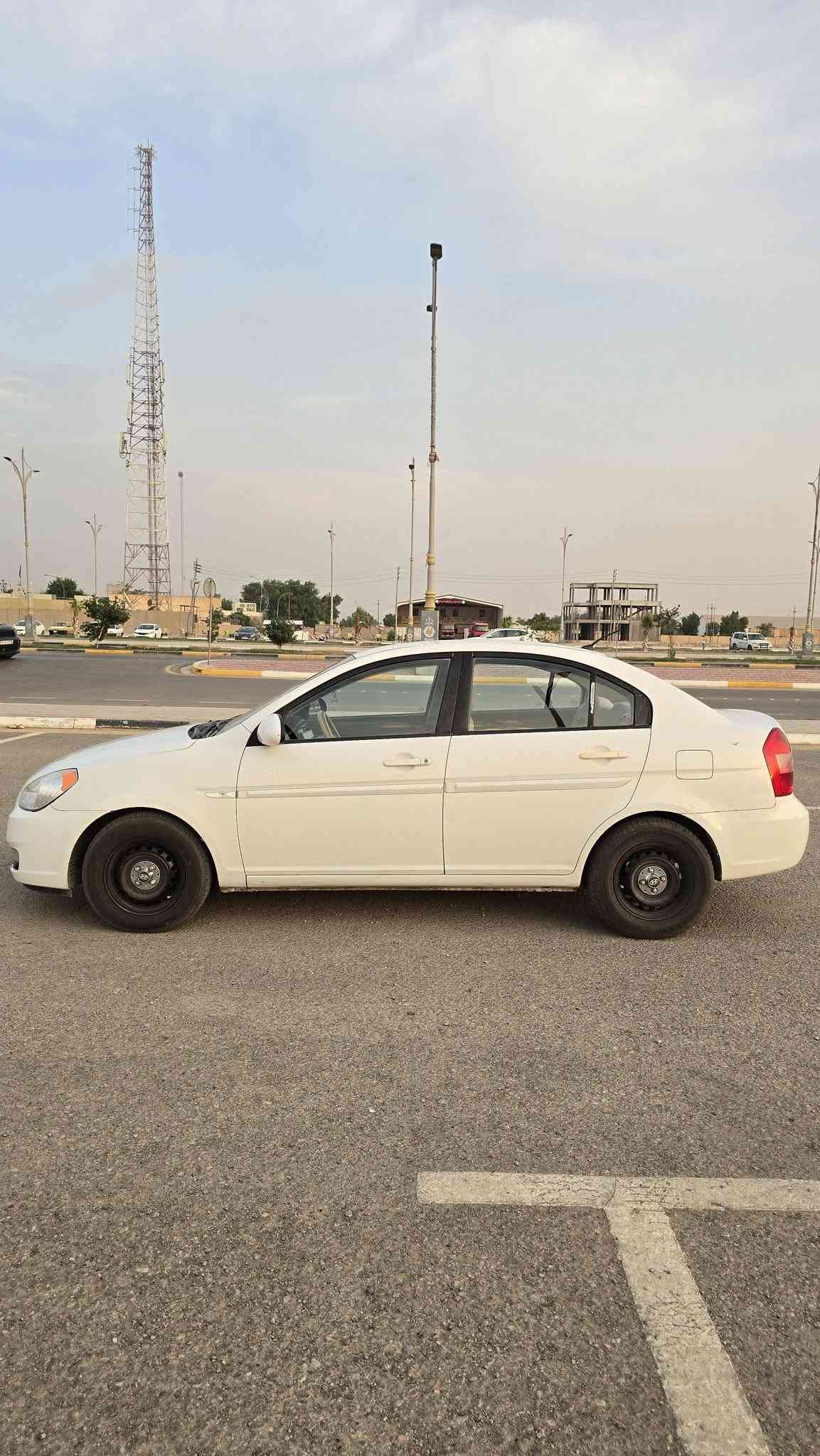اكسنت ٢٠٠٩ • مكفولة جير ومكينة • رقم بغداد