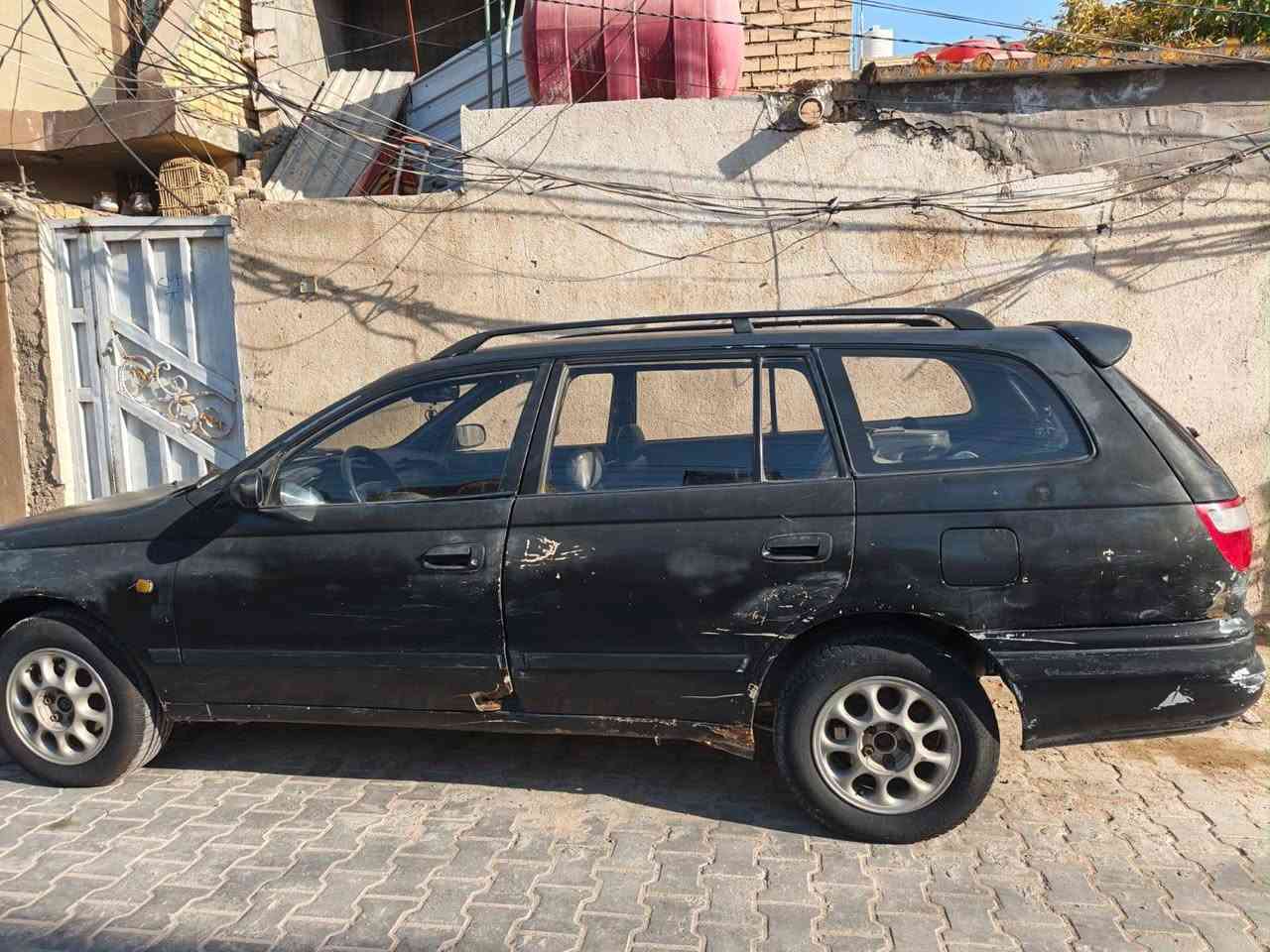 كرونه كارينه نفخ ٩٥  نجف بسمي تبريد شغال مكفوله من الكص والضربه القويه حداديه جديده باتري جديد تايرات جديده محرك كير مكفولات مكاني النجف شراي يتصل ع رقم ***********
