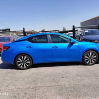 نيسان سنترا SX2025 ماشيه 19000 فول مواصفات فتحه وخمس كامرات محيطيه داخ...