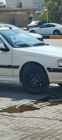 س.  ع  ويل مع طخم تاير   بيجو بارص  حجم   15  للبيع   موقع بغداد العبي...