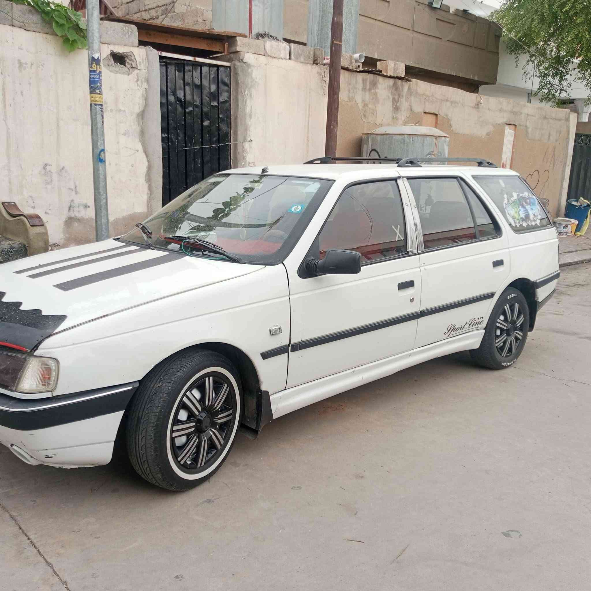 بيجو • فرنسي • رقم بغداد