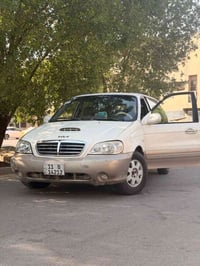 كيا كرنفال 2004 للبيع مكينة 2900 كاز كير جديد خير من الله عدد الركاب 9...