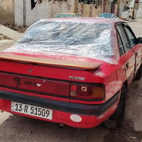 مازدا 323 • صندوك • رقم انكليزي