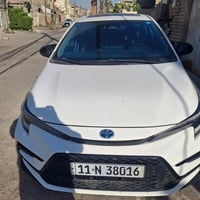 كورولا هايبرد • ماشيه ٥٠ الف • رقم بغداد