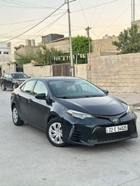 كورولا ٢٠١٨ • اخضر غامق • رقم كركوك