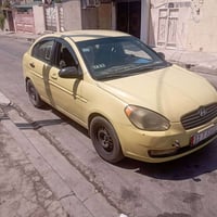 اكسنت 2009 وارد امريكي  رقم مسطره بغداد سنويا جديد  كابون جديد  هيئة و...