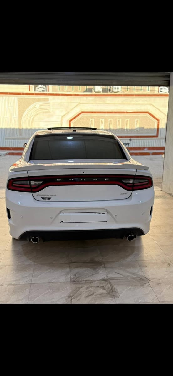 دوج جارجر  SUPER TRACK PAK / GT.
الموديل : 2019 . (خليجي) .
المحرك : V6 . 3.6L .
العداد : 39 الف كيلو متر 

المواصفات : -
كت SRT . 
سستم صوت ALPINE . 
فتحة سقف سلايد . 
LED لايت . 
كير شفتر بالستيرن . 
شاشة 8.4 انج
 اوپشنات ال SRT .
 كاميرا دوارة.
 حساسات خلفية .
 ويل قياس 20 أنج كاربون . 
تشغيل عن بعد .
 مقاعد سبورت جلد .
 كشن كهرباء . 
جناح خلفي .
CAR PLAY .
وبعد بيها مواصفات علما السيارة بحالة الوكالة ، استخدام شخصي 
رقم شمالي مميز وكالة هارلم 
تحويل مباشر بأسم المشتري او وكالة حسب الرغبة ،
مكان السيارة / البصرة 
لمعرفة السعر اتصل على /*********** + واتساب + ماسنجر
السيارة كفالة عامة (محرك + كير + بدي + رسميات وتحويل الملكية) البصرة, العراق
