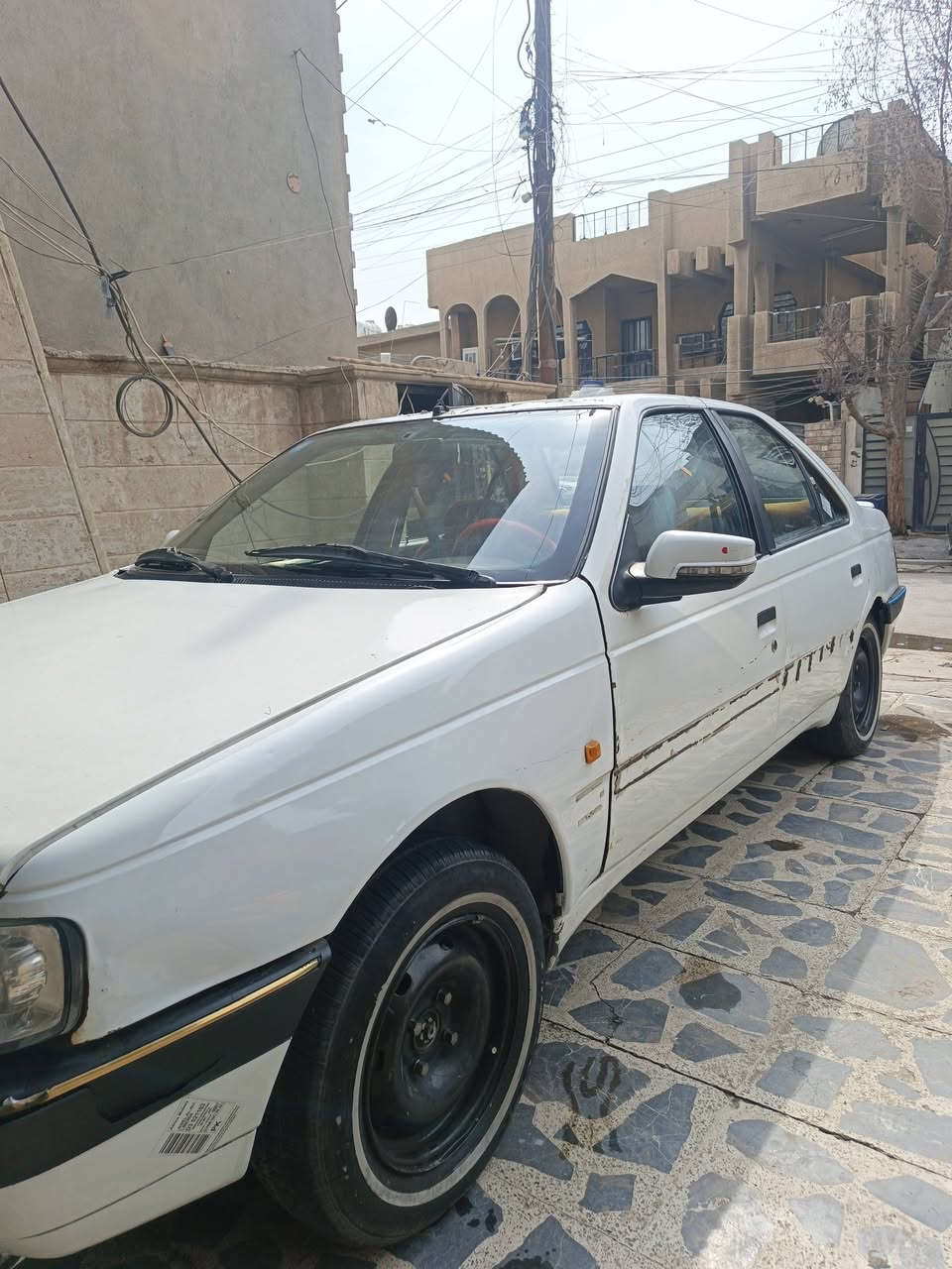 بيجو لميس • ٢٠١٢ • رقم بغداد