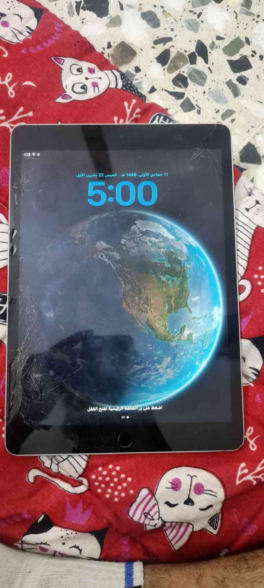 آيباد ٩ • ٣٢ • شاشة مكسورة