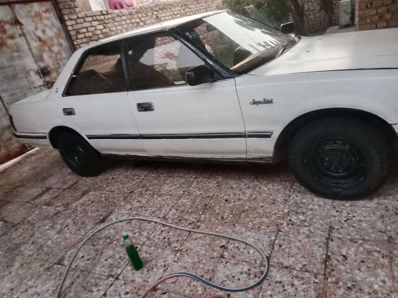 سيدان ونجي تبريد رقم واسط إنكليزي بسمي في الحي ***********
