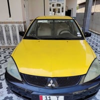 لانسر ٢٠٠٩ • محرك ١٦٠٠ • رقم بغداد