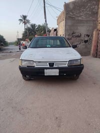 بيجو 405 • رقم نجف • شنطة مضروبة