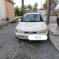 بروتون ٢٠٠٤ • ورقه باسمي • منصوري