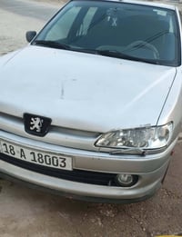 بيجو 306 موديل2003 لون سلفري رقم بابل  انكليزي سنوية بأسمي شرط تحويل ث...